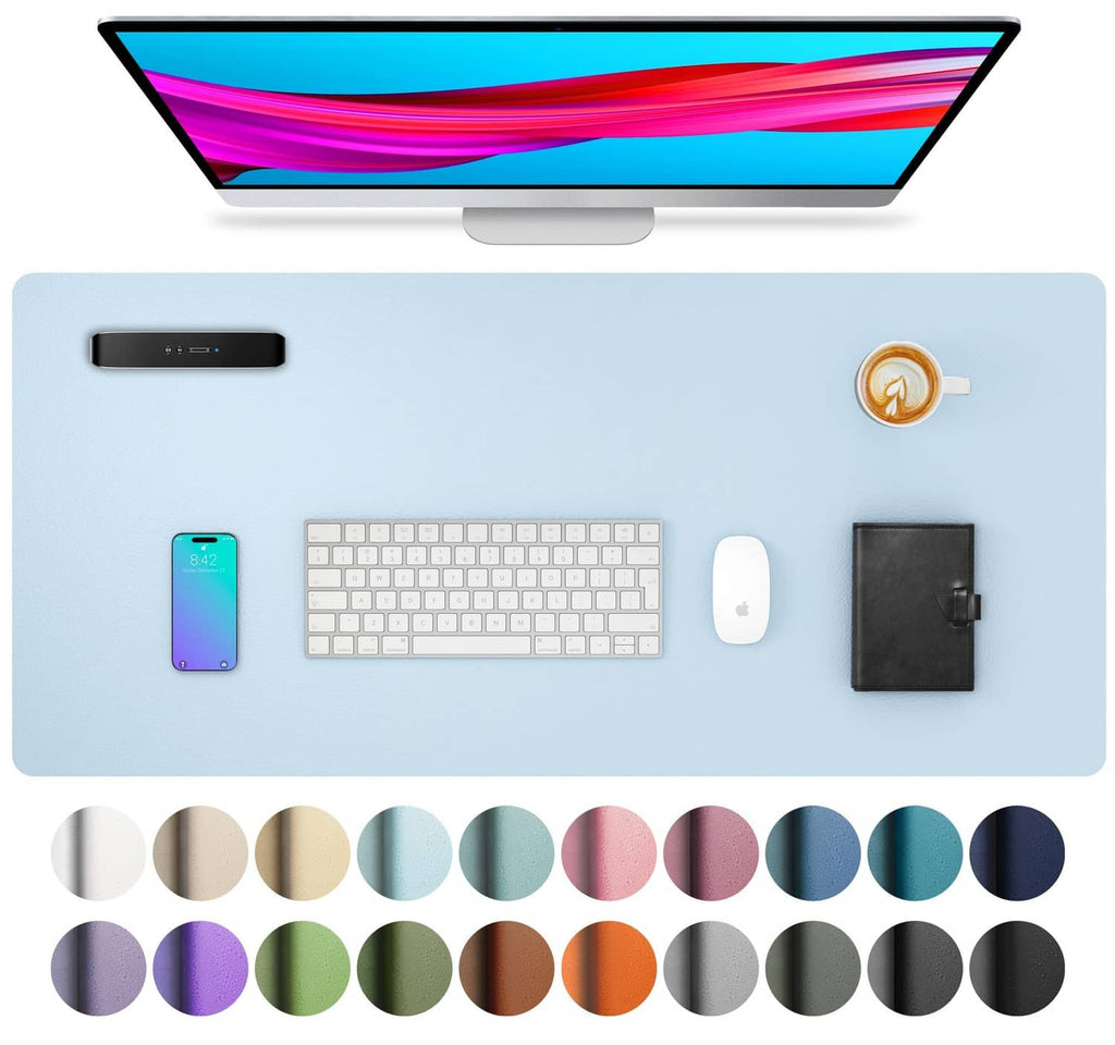 Baby blue desk pad protector on office desk with keyboard and computer