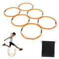 Orange octagonal agility rings with black connectors, plus included black storage bag.