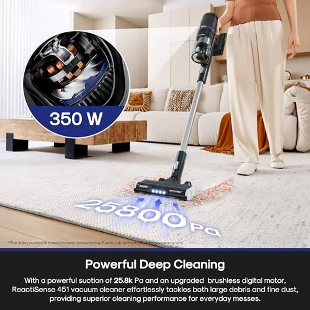 Black cordless stick vacuum cleaning carpet with floor brush nozzle