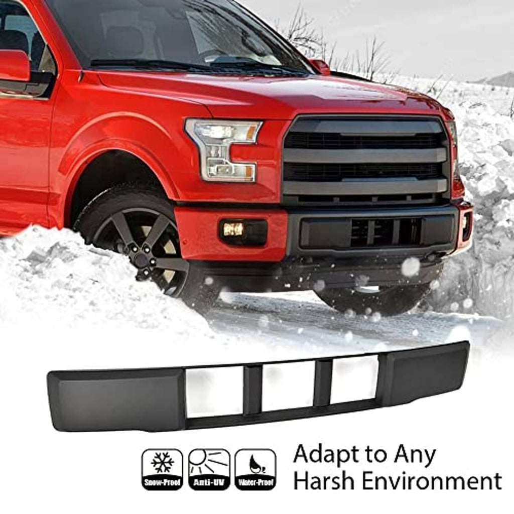 Black front bumper lower grille trim panel with vertical slat openings