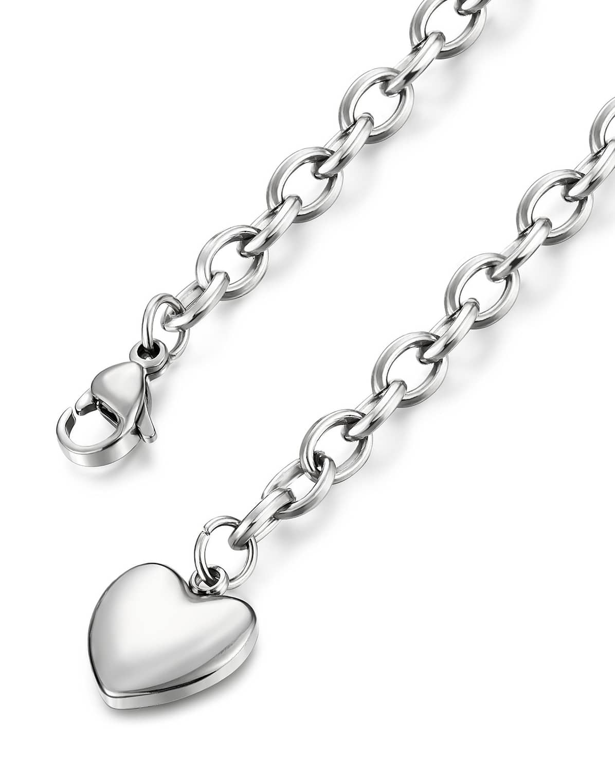 Close-up silver-tone heart charm bracelet links with lobster clasp and heart pendant