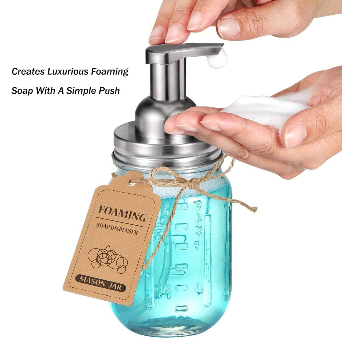 Stainless steel foaming soap dispenser pump lid with push-top on a blue mason jar