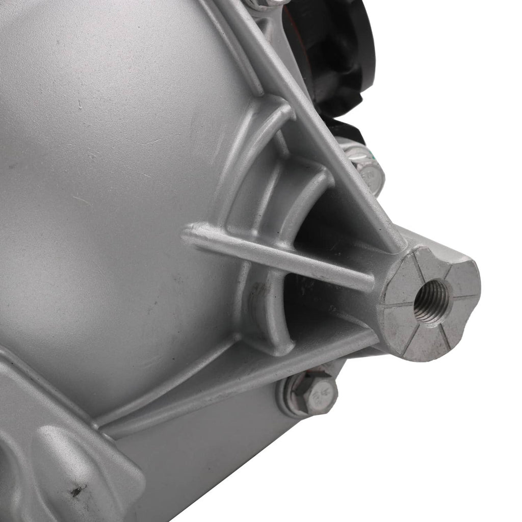 Rear differential carrier assembly, close-up of silver housing rib and side threaded port