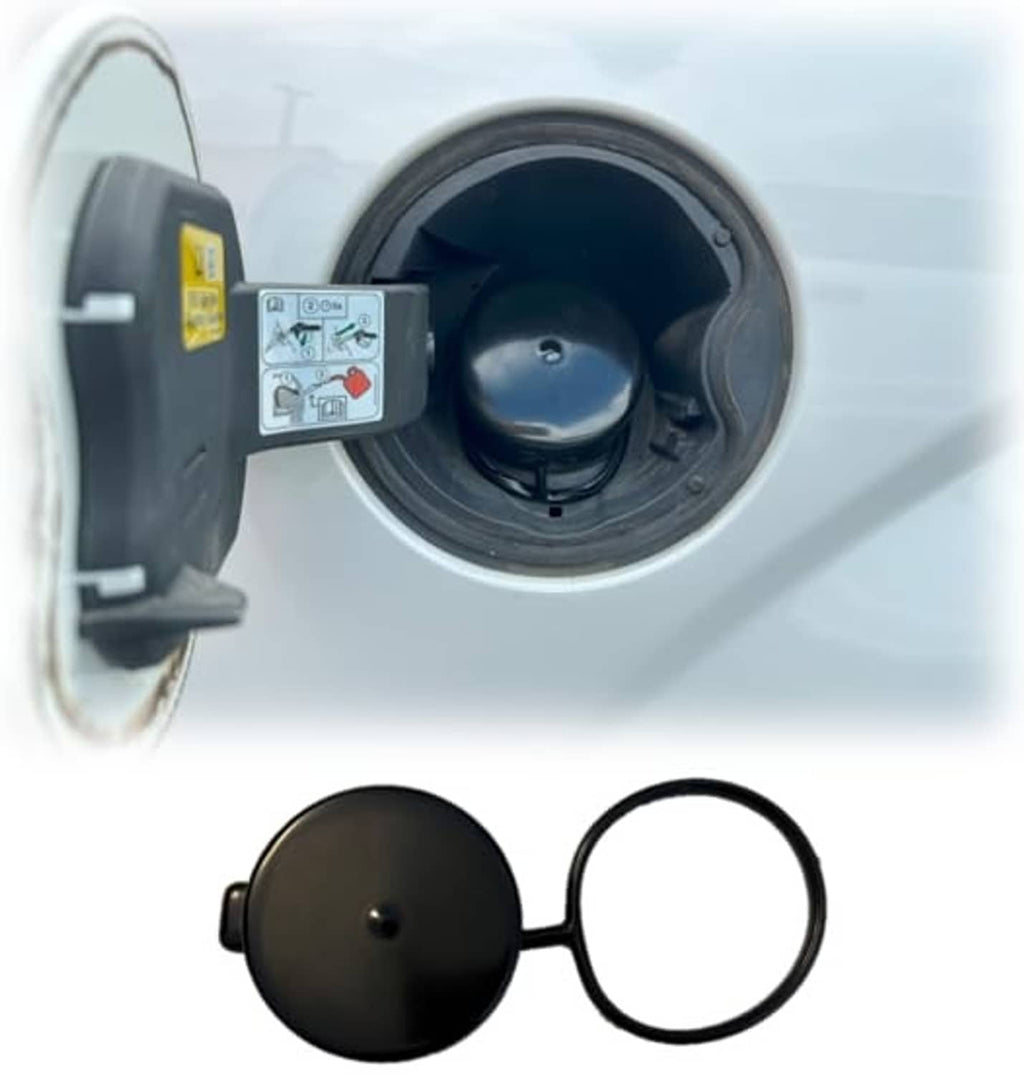Tethered black gas cap dirt cover with lanyard ring at fuel filler opening