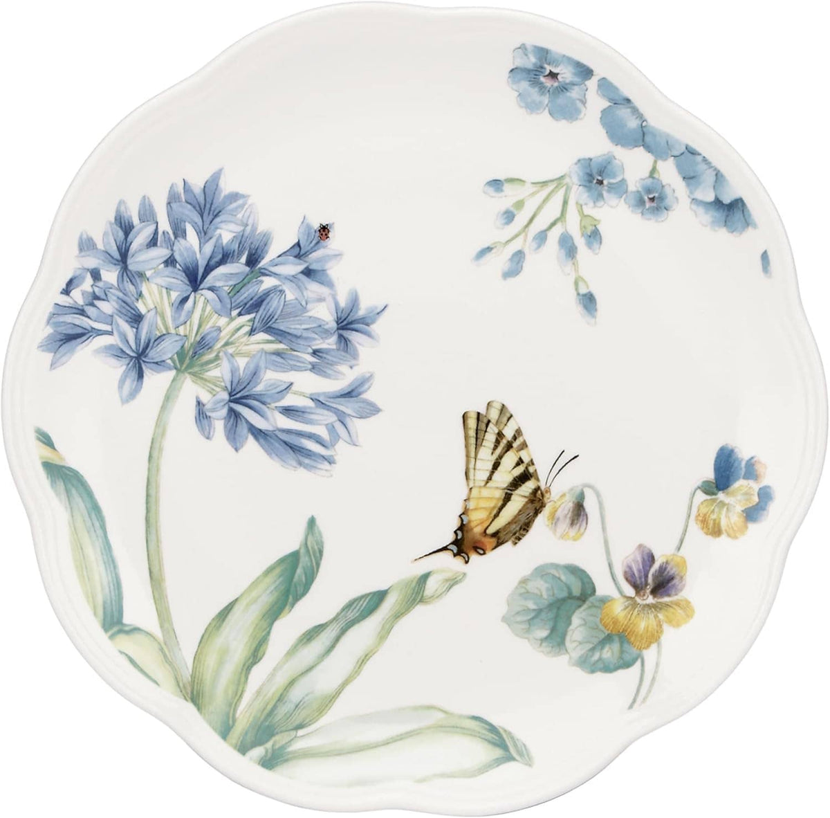 Round dessert plate with blue flower bouquet, butterfly motifs, and green leaves on white.