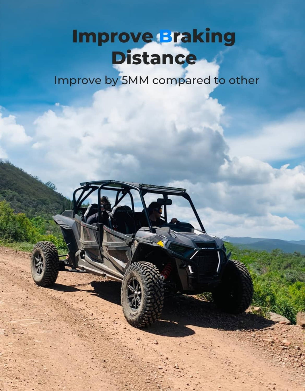 UTV on a dirt road with parking brake lever accessory, black and red.
