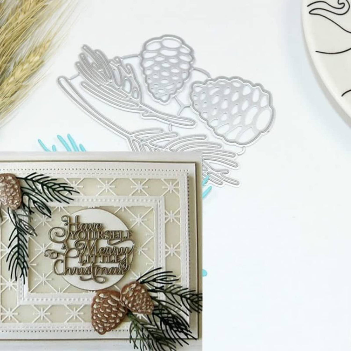 Silver metal pine cone and leaf die cuts for Christmas card making