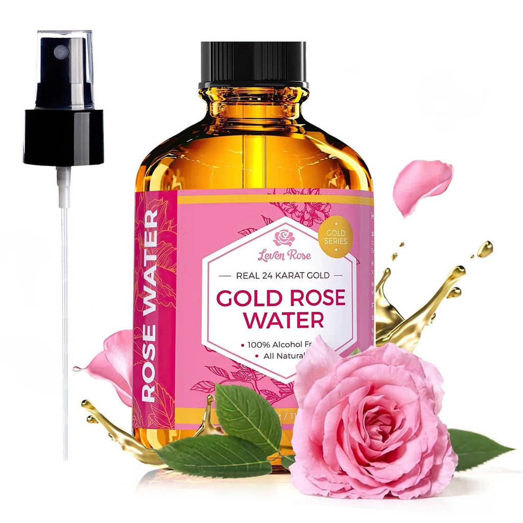Gold rose water toner bottle with pink label and spray pump, with rose petals nearby