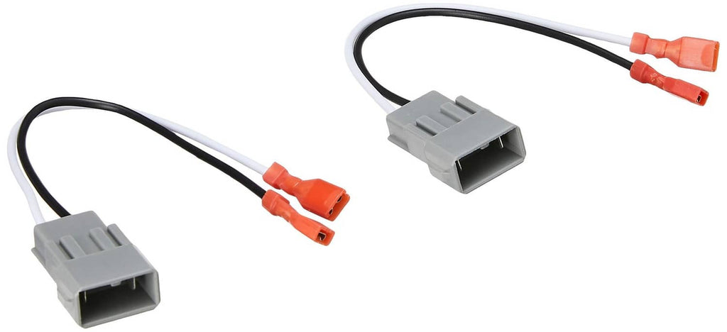 Gray car audio wiring harness adapter with orange connectors and dual plugs