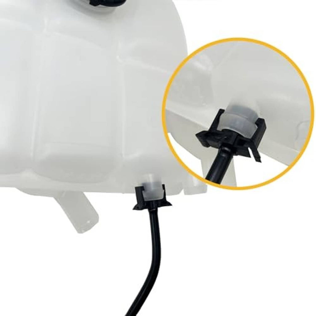 Close-up of coolant reservoir tank outlet area with black hose connection