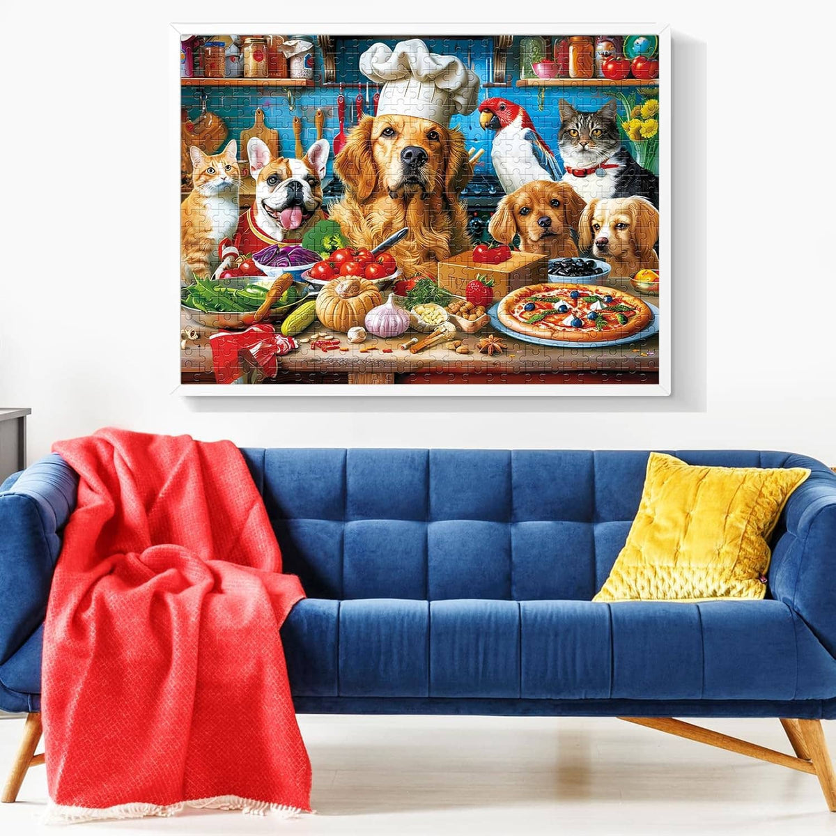Framed 500-piece dog and cat puzzle artwork hanging above a blue sofa