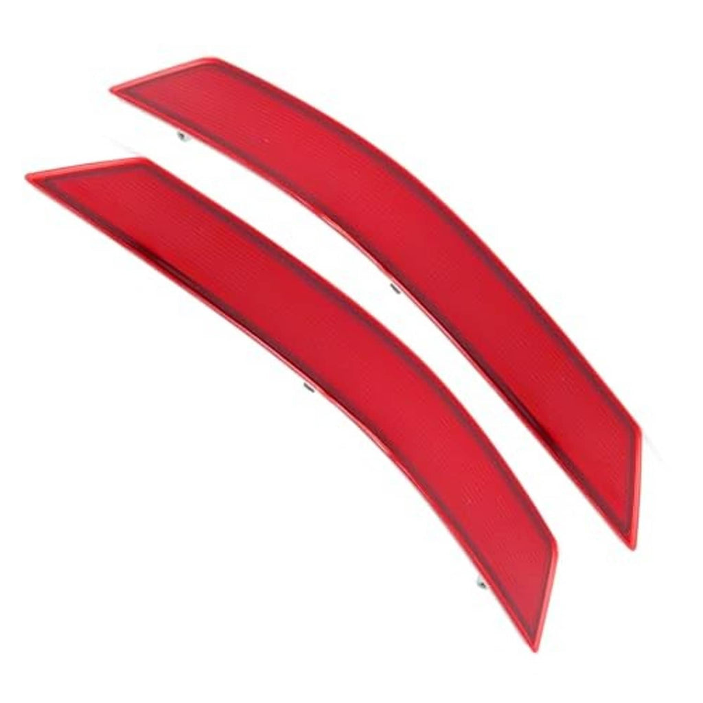 Two red rear bumper reflector inserts with mounting holes