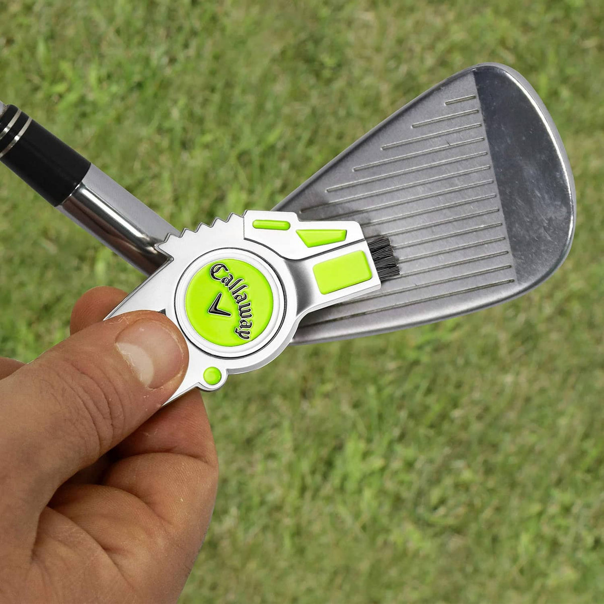 4-in-1 golf divot repair tool with lime scraper blade and Callaway emblem