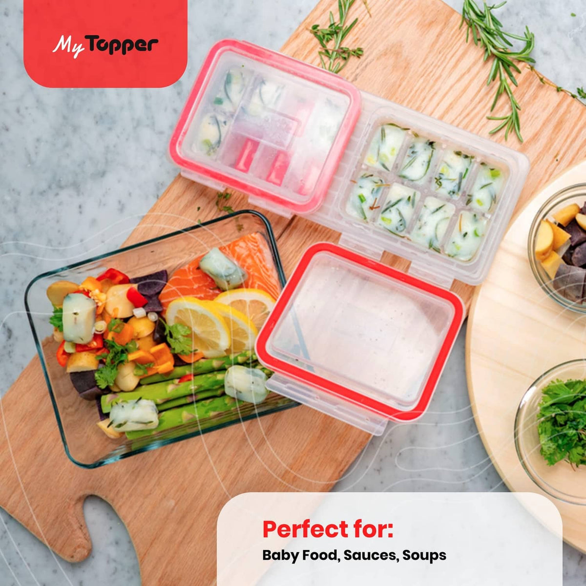 Clear ice cube tray with two attached red-lidded covers, compartment inserts for frozen portions.