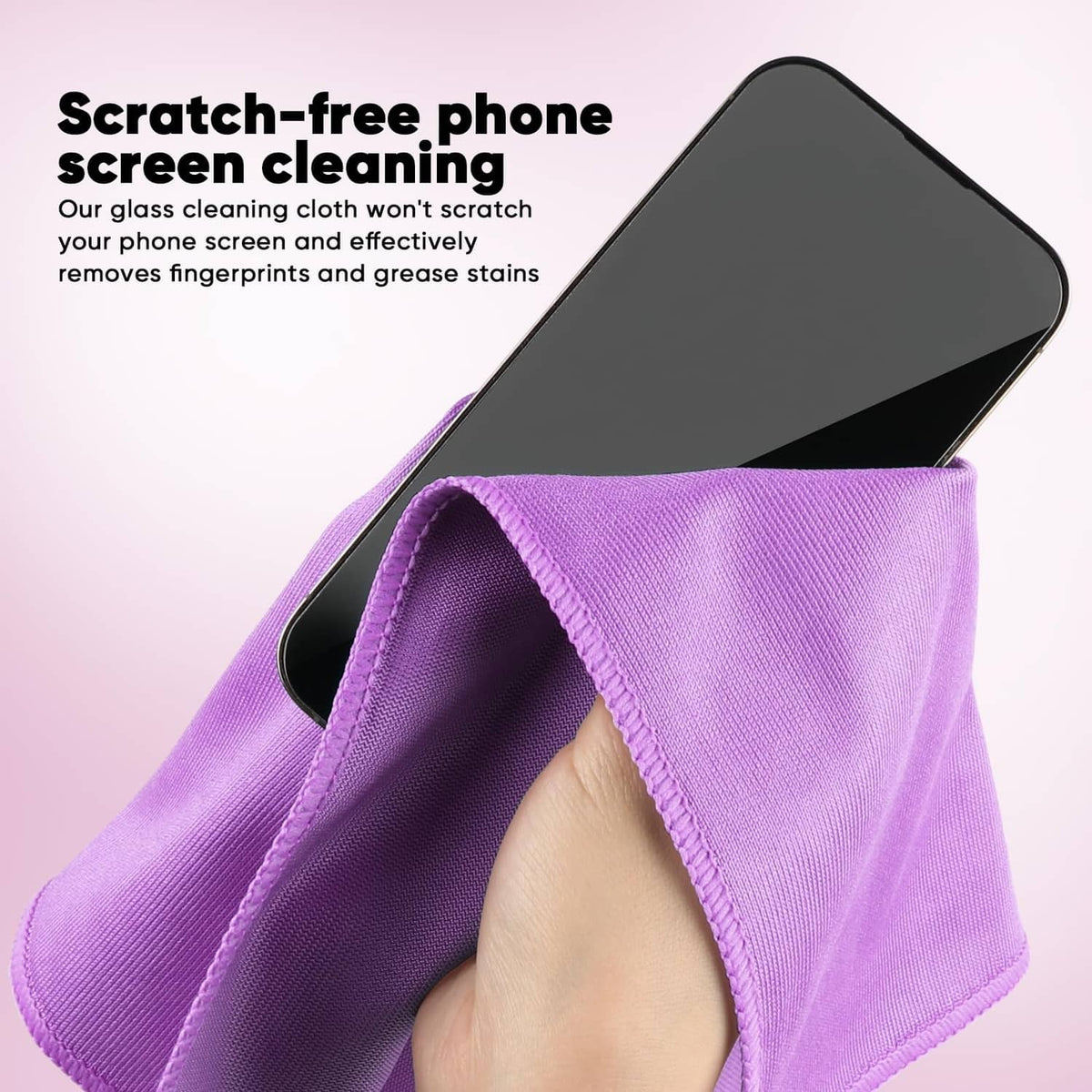 Purple microfiber cloth partially covering a smartphone screen