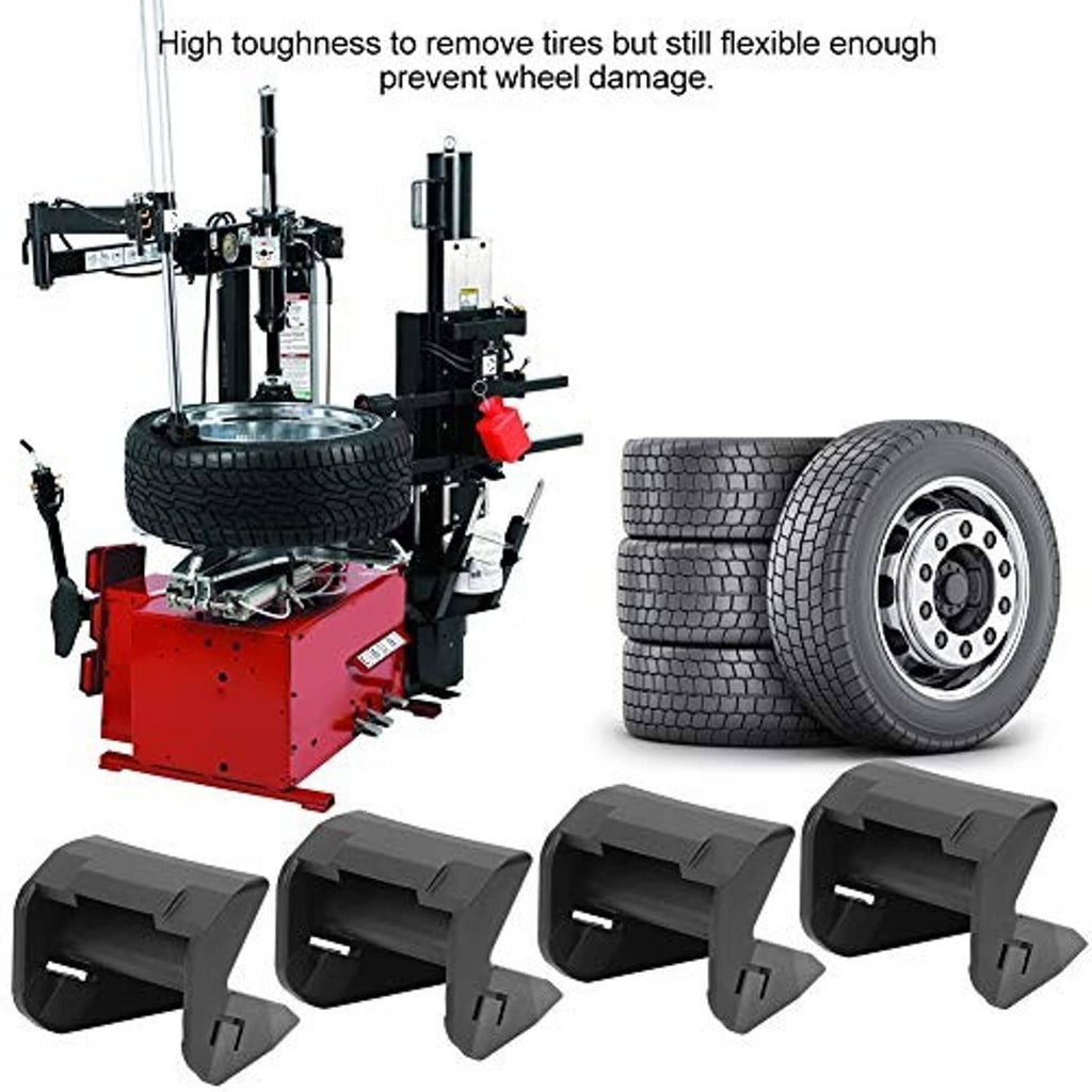 Tire changer jaw protectors set: four dark gray guards shown near wheel rim