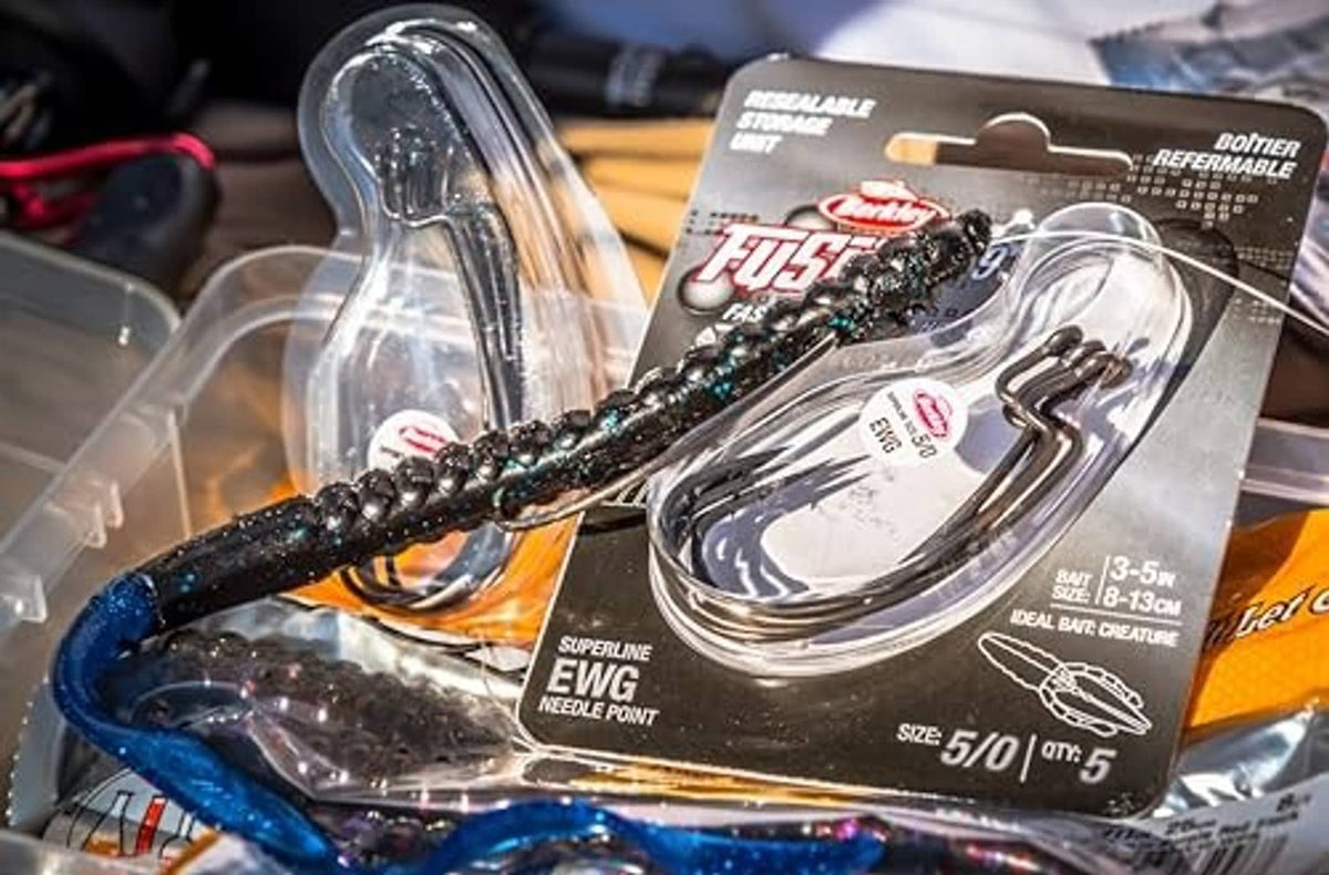 Soft plastic fishing worm package with black-and-blue fleck worm detail
