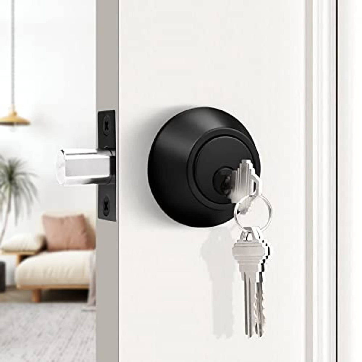 Black round double cylinder deadbolt on door with keys
