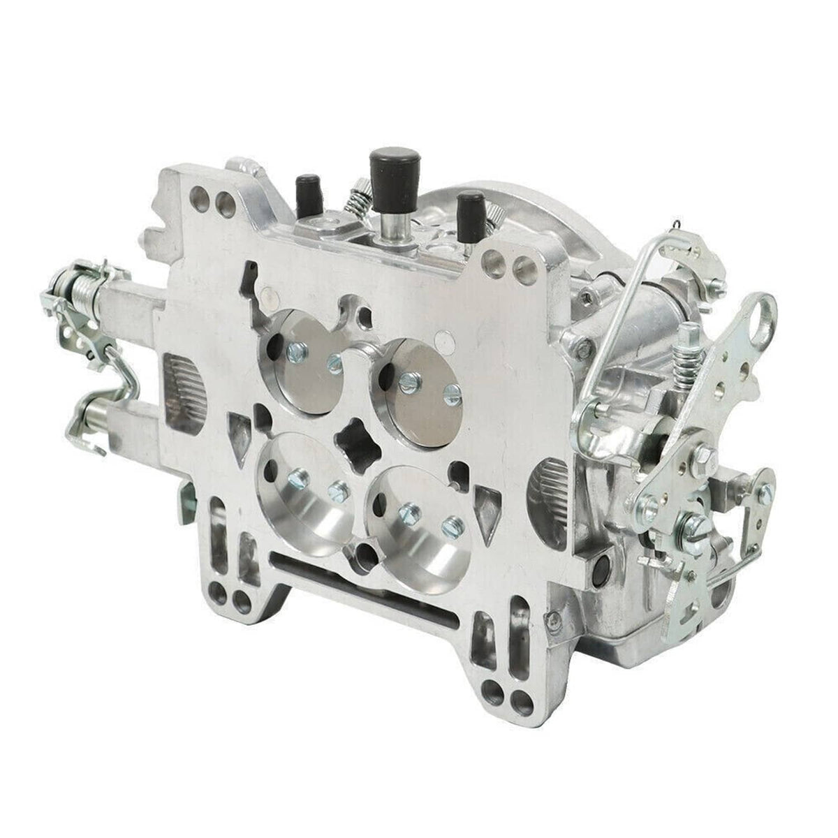 Four-barrel carburetor underside view with machined ports and mounting points