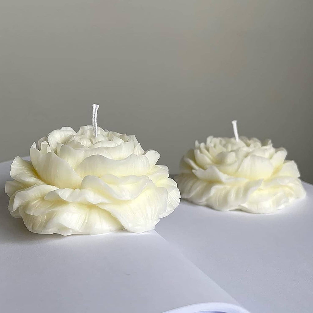 White peony-style flower candles, two pieces with exposed wicks