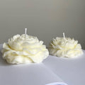 White peony-style flower candles, two pieces with exposed wicks