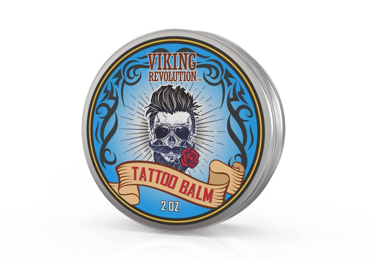 Viking Revolution tattoo care balm tin, blue skull rose label, 2 oz round container