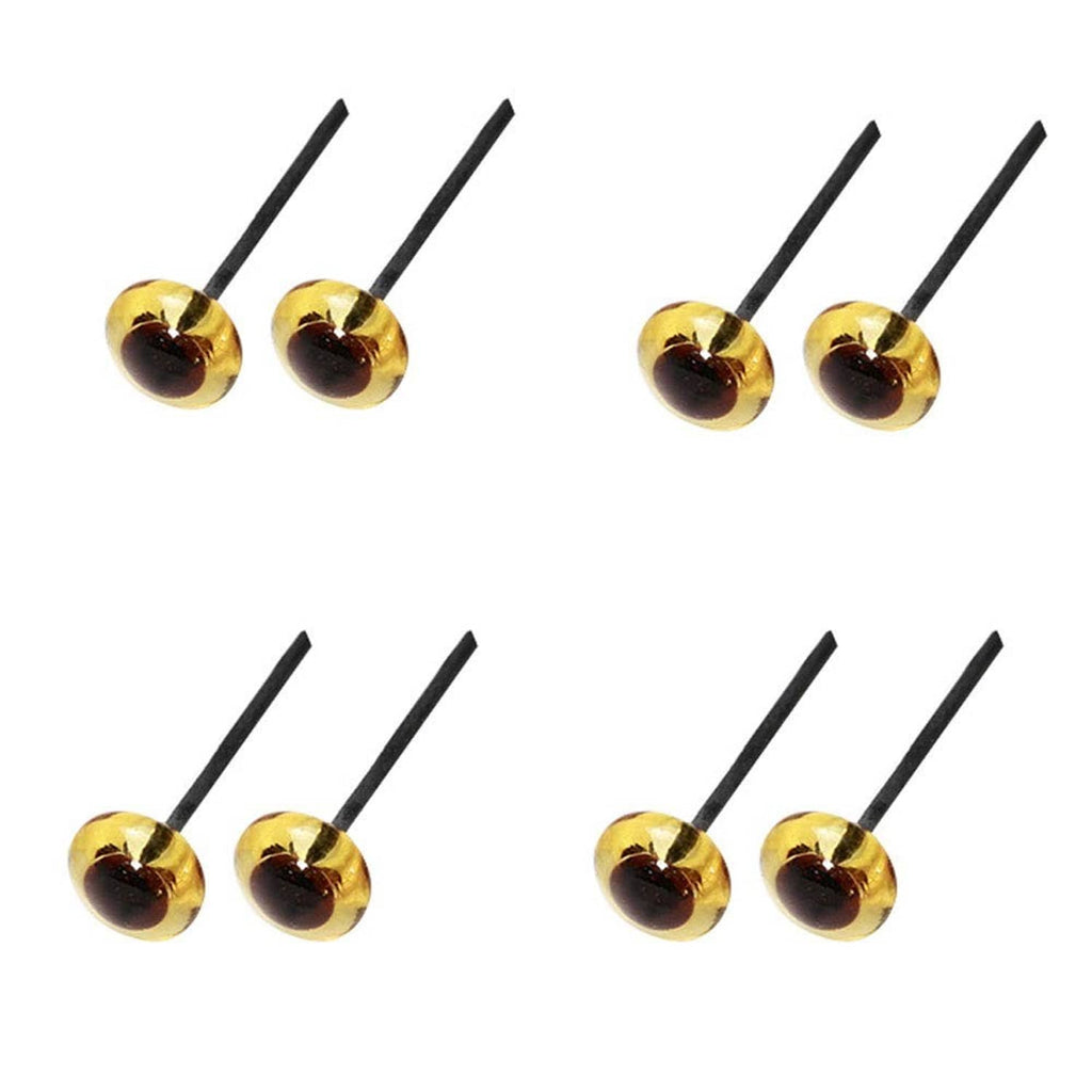 Amber glass eyes with black stems, six pairs shown