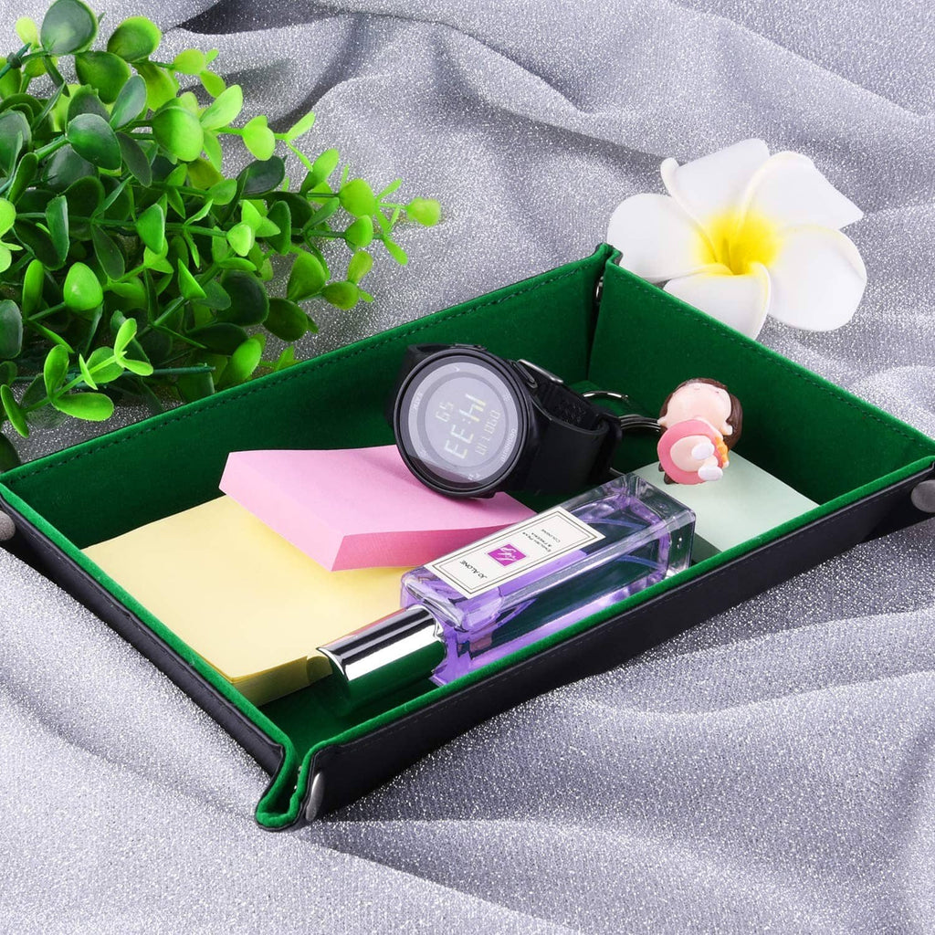 Green folding dice tray with metal snap corners, holding small cards and supplies