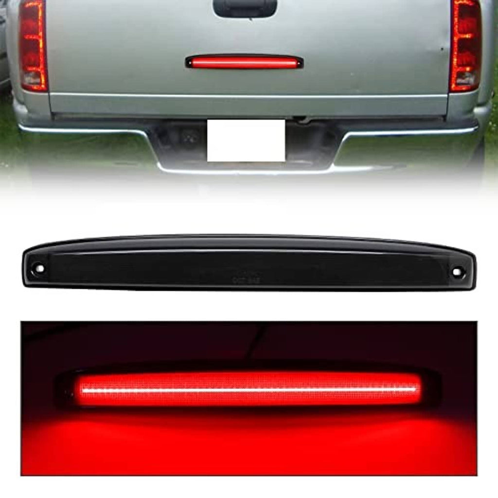 Smoked red LED tailgate light bar glowing with a red light strip, black housing