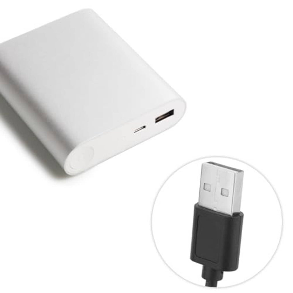 White USB power adapter with two USB ports and a black USB-A connector cable