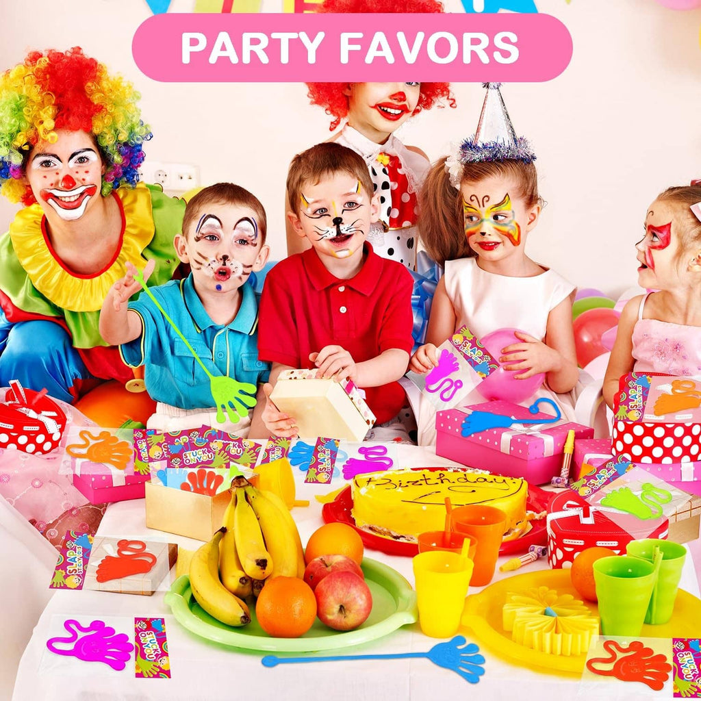 Children holding colorful sticky hand and foot party favors on their hands