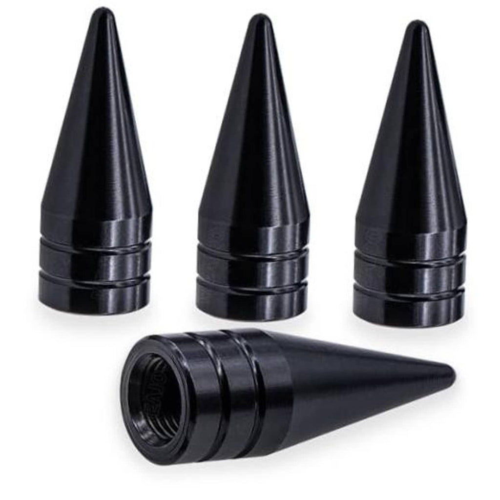 Four black cone-shaped spiked valve stem caps with ribbed grip