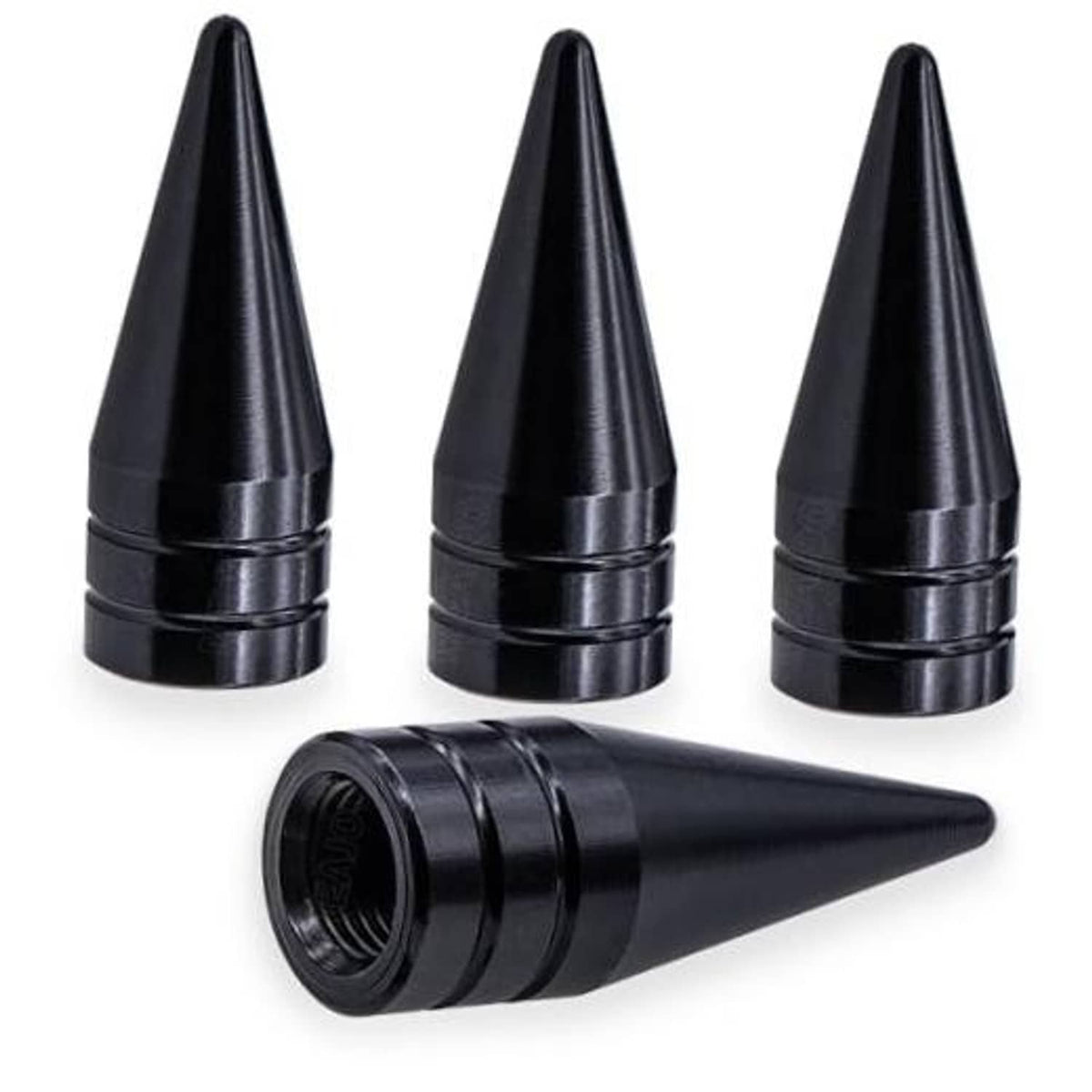 Four black cone-shaped spiked valve stem caps with ribbed grip