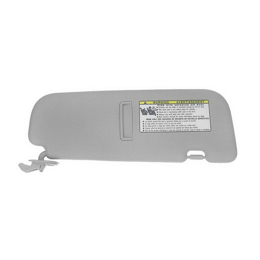 Gray car sun visor with mounting clips and warning label, standalone view