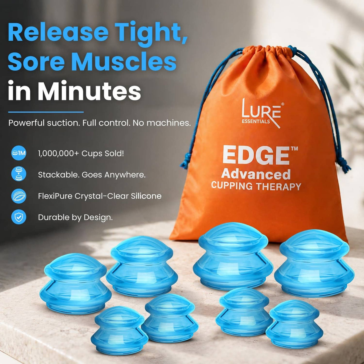 Blue silicone cupping cups arranged on a surface with orange storage pouch
