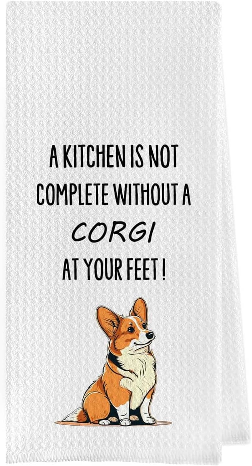 White waffle weave kitchen towel, corgi illustration with text: “A kitchen is not complete”.