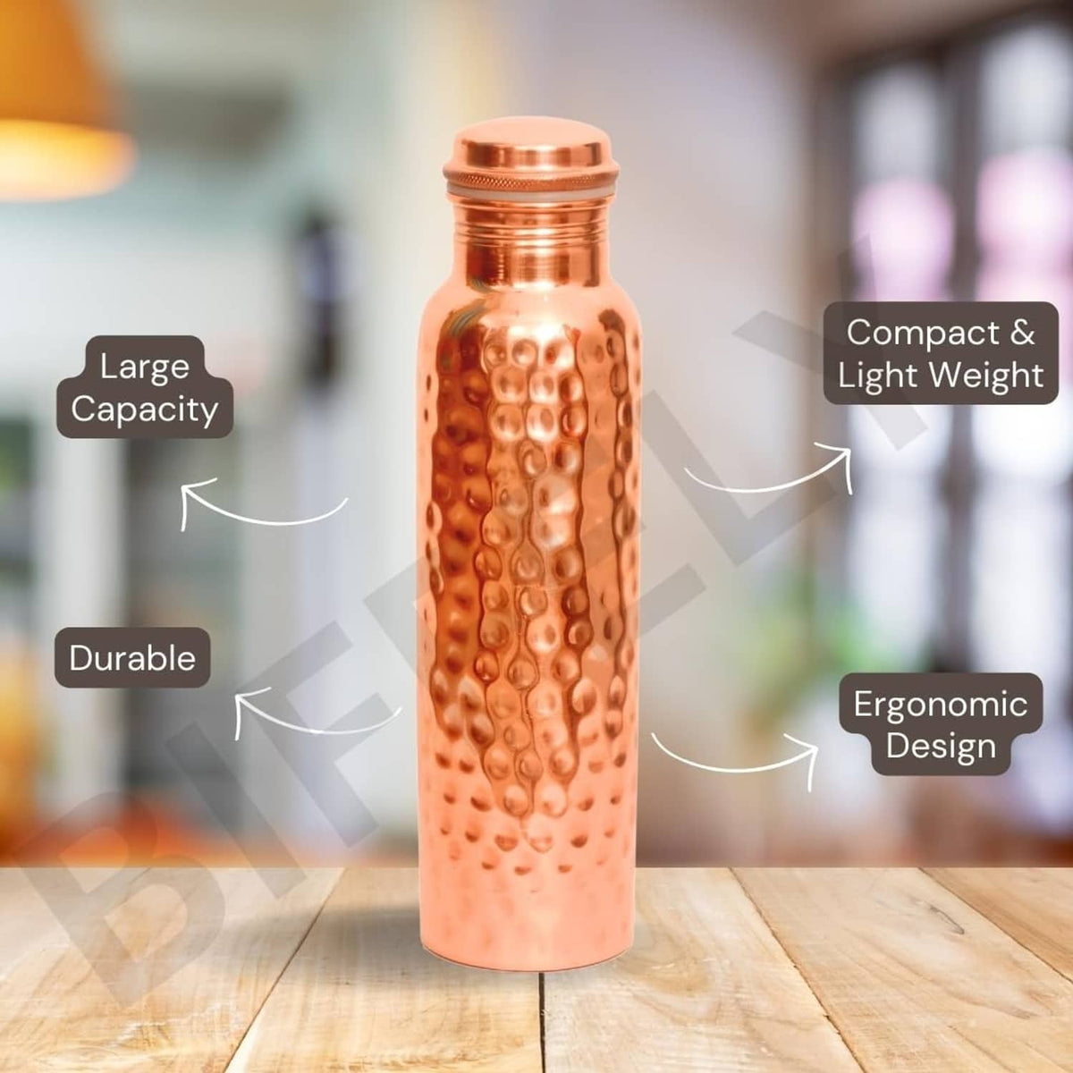 Copper water bottle with hammered finish and screw-top cap, shown upright.