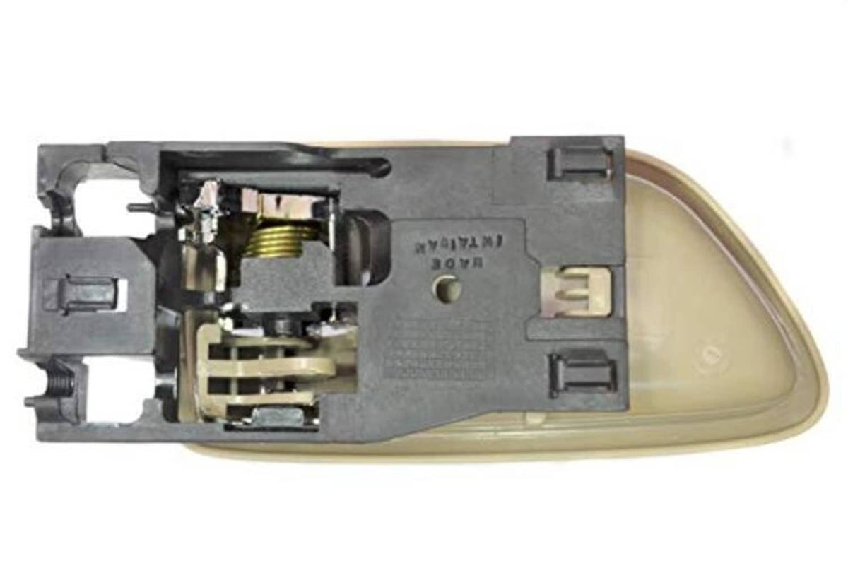 Beige interior door handle trim with exposed latch mechanism and mounting parts