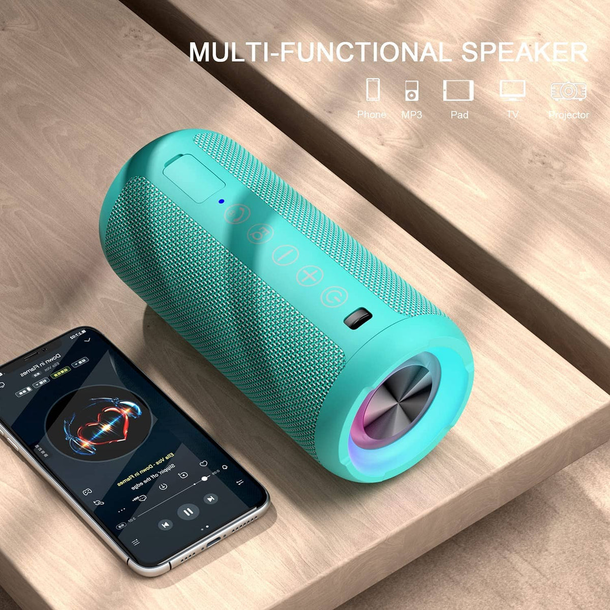 Teal Bluetooth speaker lying on a shelf with glowing ring and side button controls