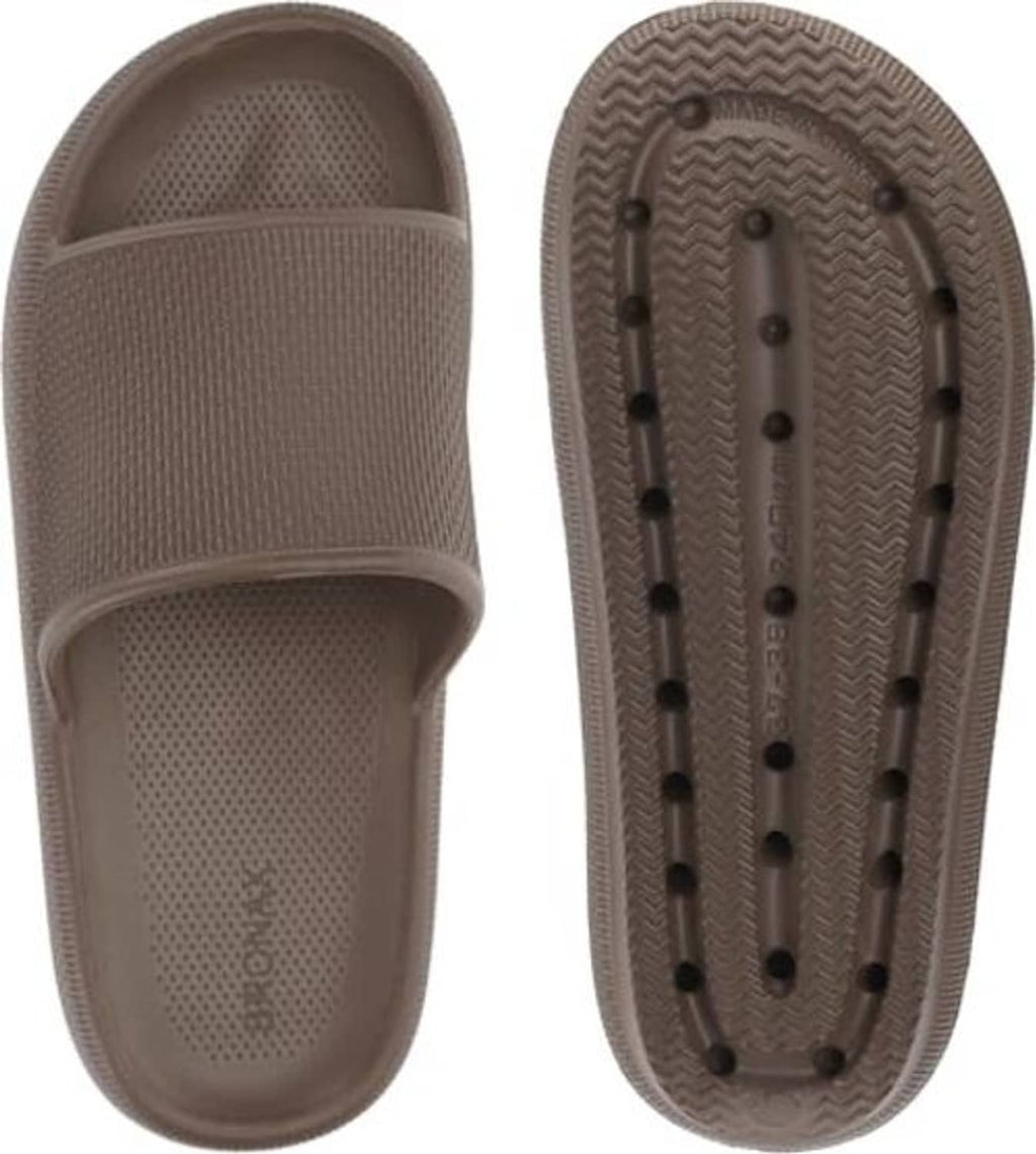 Brown slide slippers showing cushioned footbed and grippy outsole tread