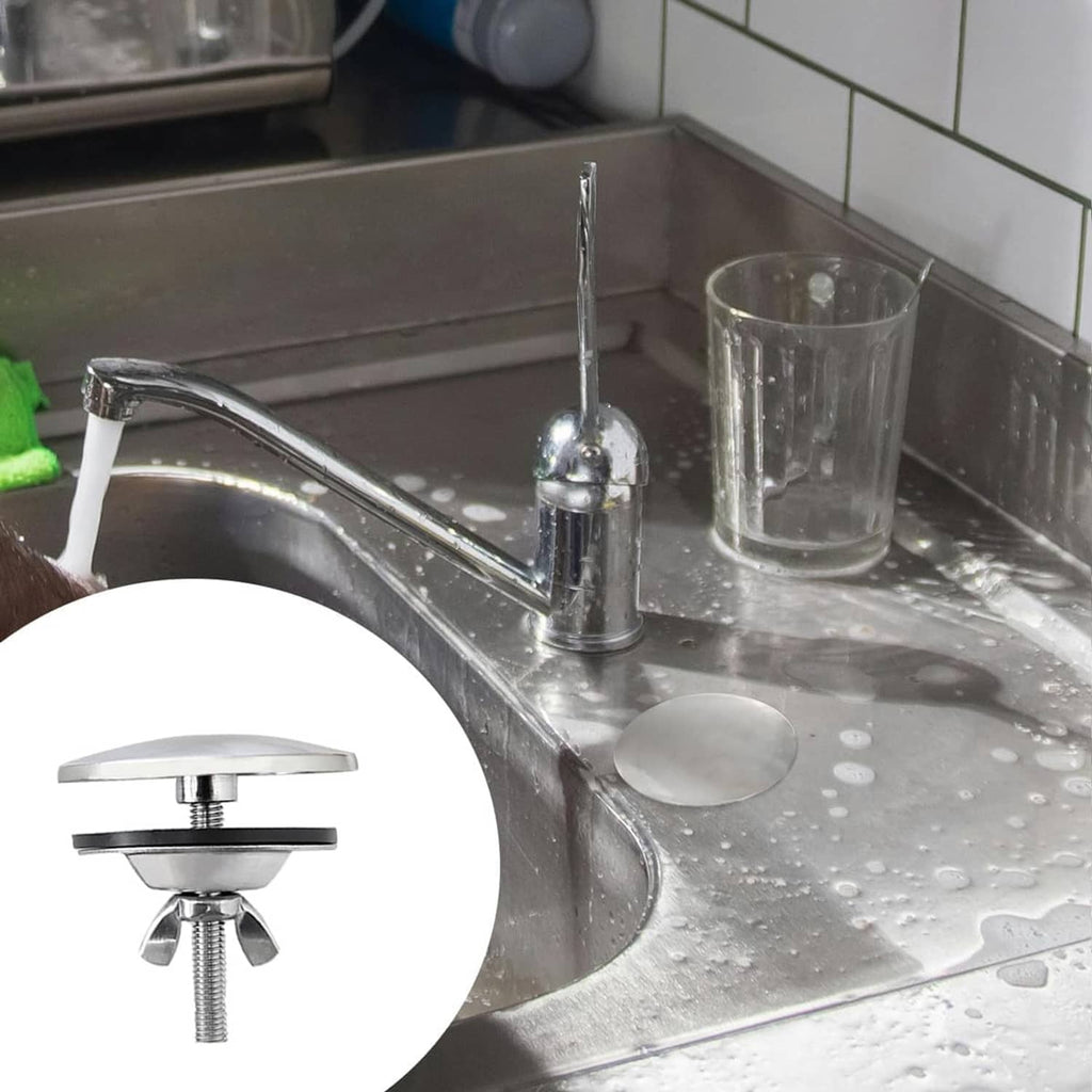 Stainless steel sink hole cover in place near faucet, round base over opening
