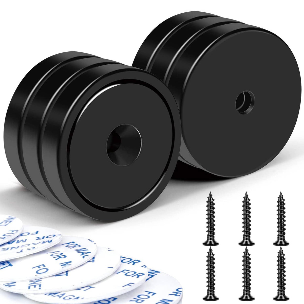 Set of black round magnets with center holes and included screws, stacked together