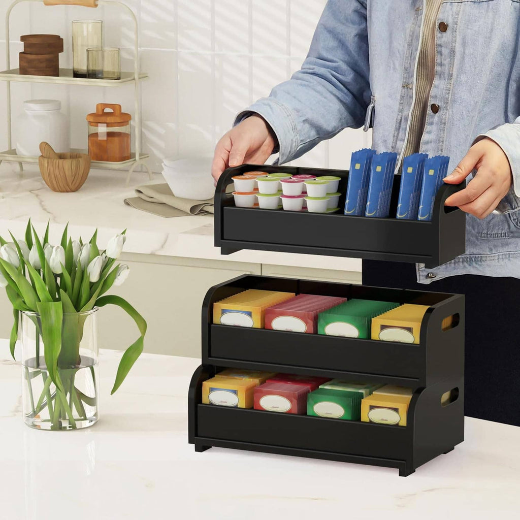 Black 3-tier tea bag organizer with open compartments for tea bags and tins