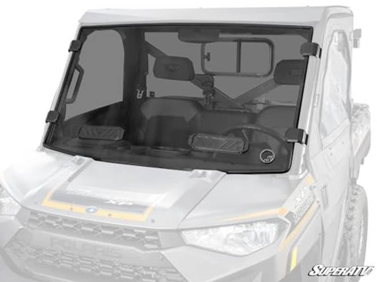 Dark-tinted full windshield installed with metal side clamps on the Polaris Ranger 1000