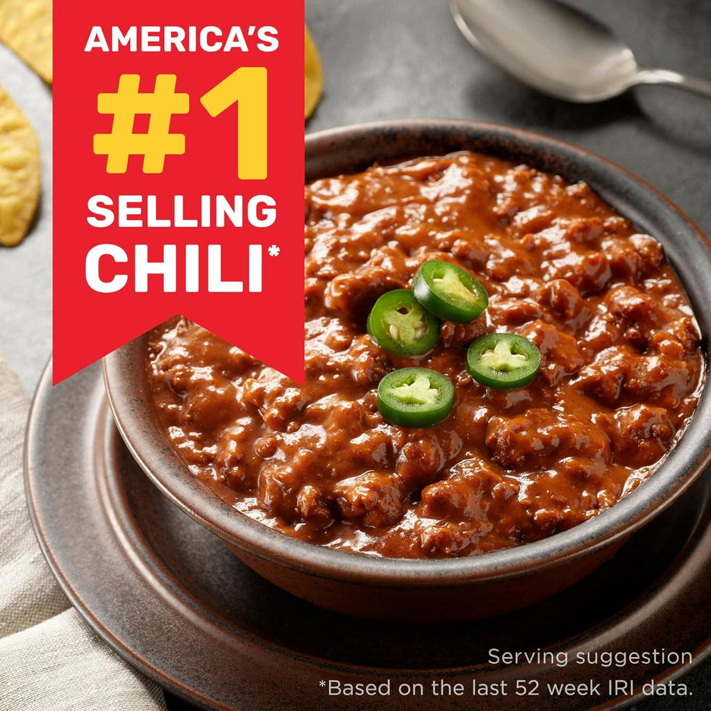 Bowls of chili with sliced green peppers garnish and branding badge
