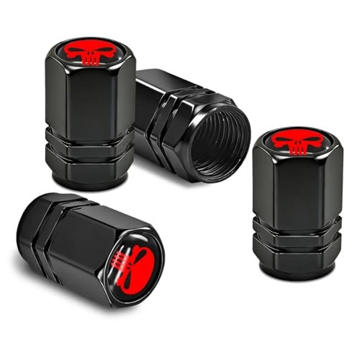 Four-pack of black metal tire valve stem caps with red skull tops.