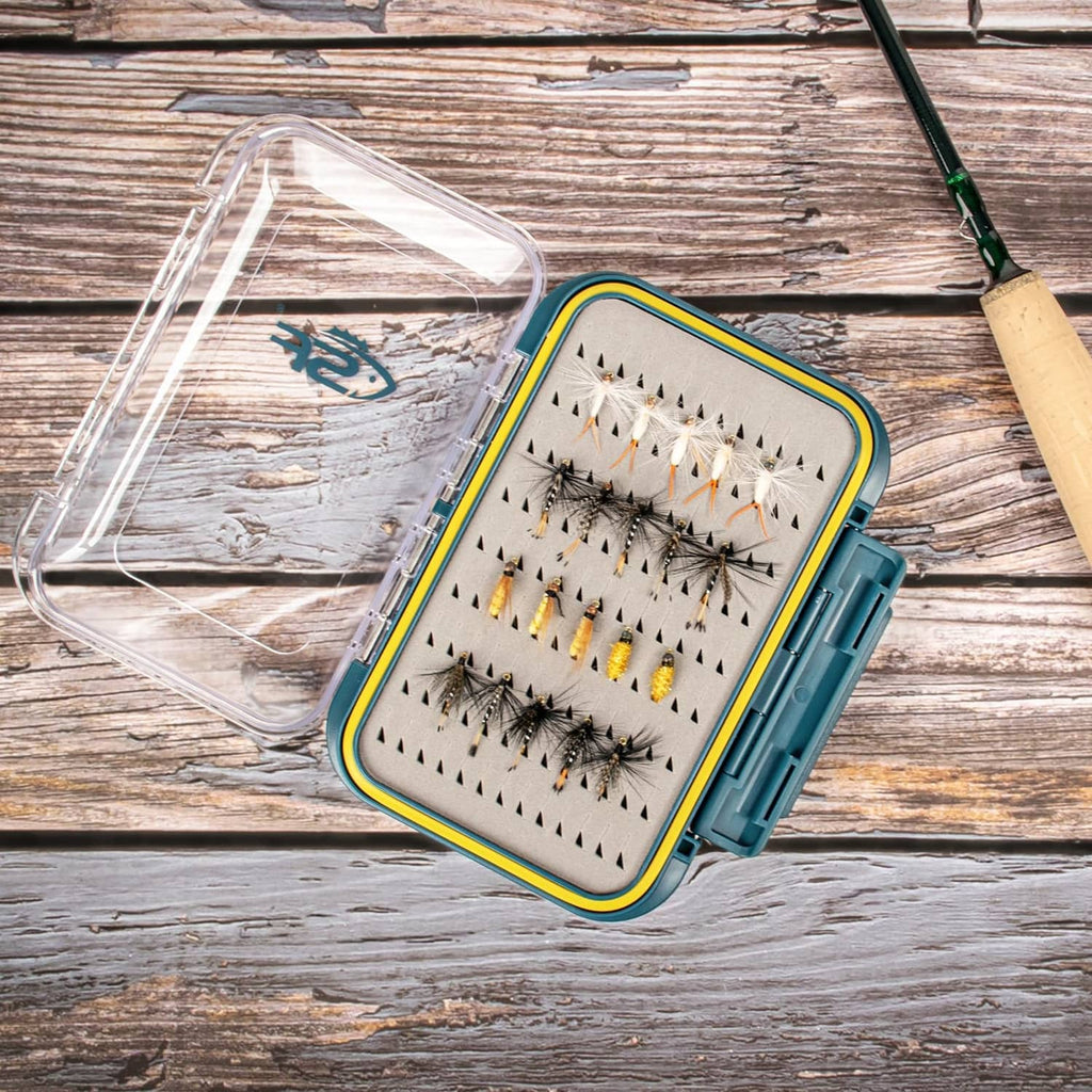 Large waterproof fly box with clear lid open, foam insert holding assorted fishing flies