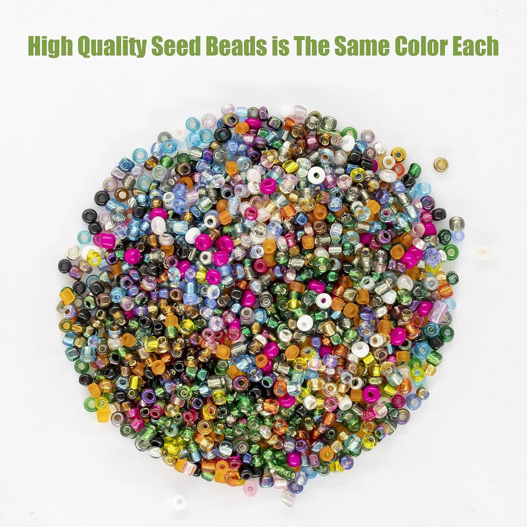 Mixed multicolor glass seed beads pile with shiny reflective highlights