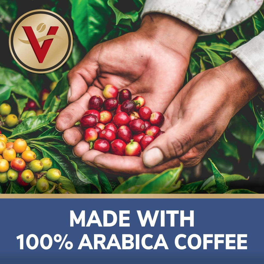 Coffee cherries in hands with Victor Allen's 100% Arabica coffee branding