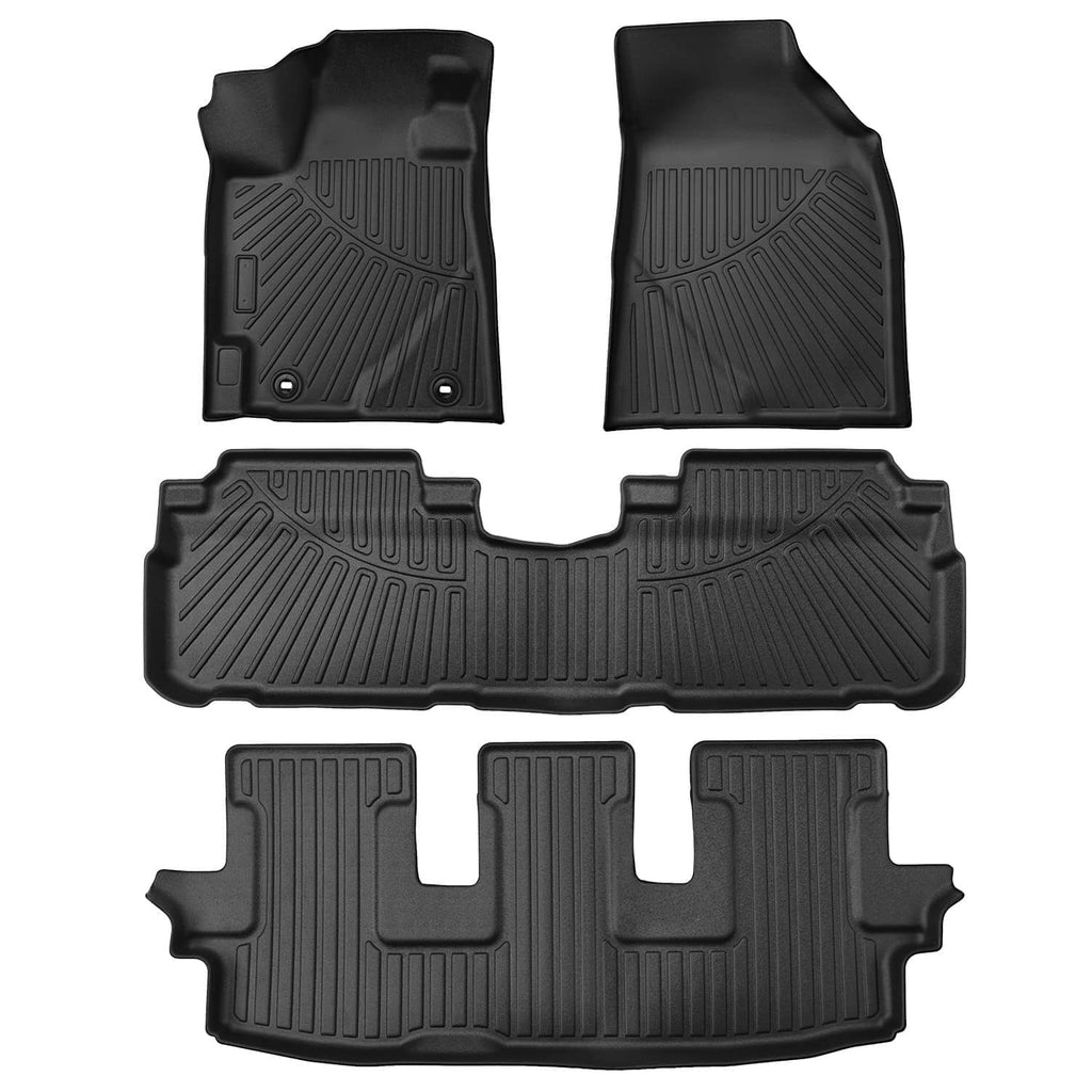 Black front and rear floor mat liners set with molded patterns and anchor nubs